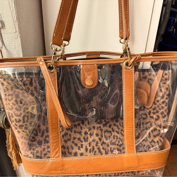 Clever Carriage Company Handbags - Beautiful Clever Carriage Company clear animal print versatile purse